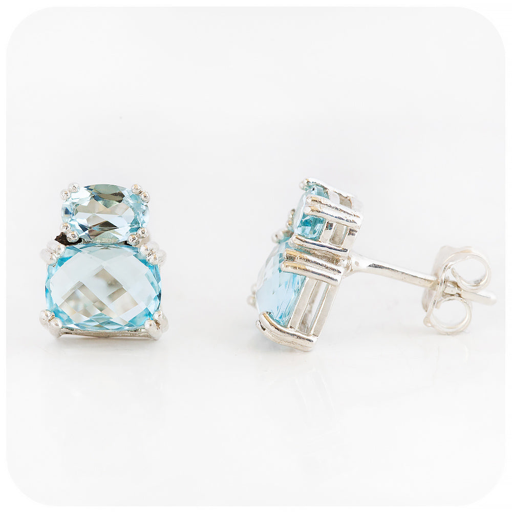 sky blue topaz stud earrings in sterling silver