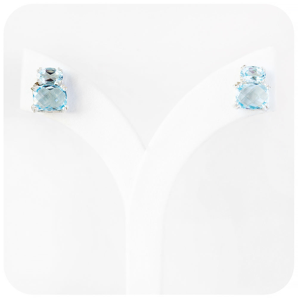 sky blue topaz stud earrings in sterling silver