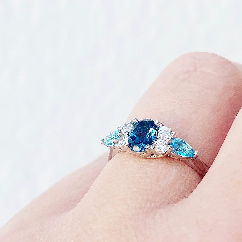 Ariana, a Topaz and White Sapphire Ring