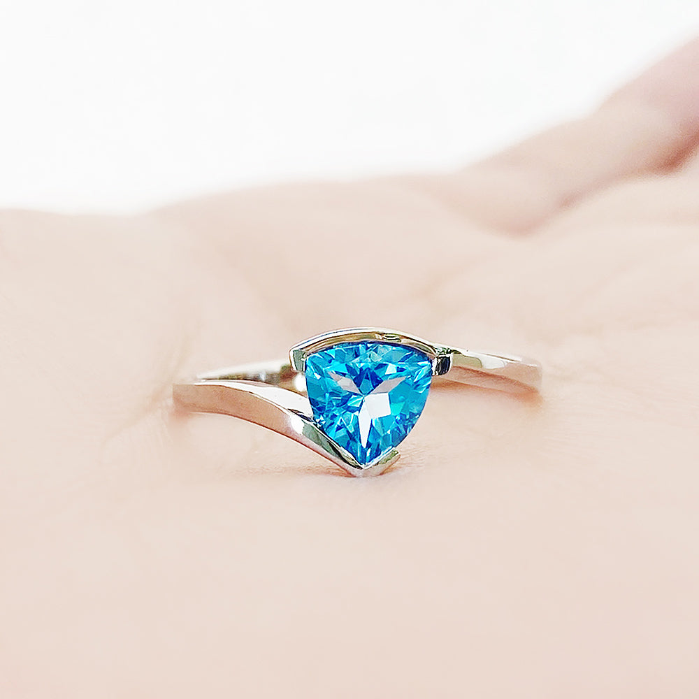 Trillion cut Swiss Blue Topaz Ring in White Gold - Victoria's Jewellery