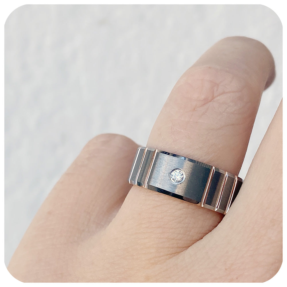 Tungsten mens wedding ring with silver brushed finish and rose gold plating, featuring a cubic zirconia stone - Victoria's Jewellery