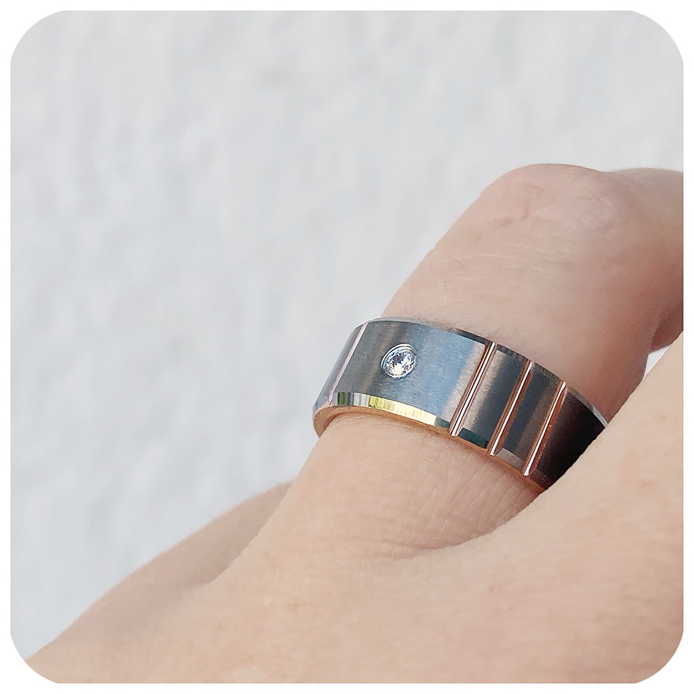 Tungsten mens wedding ring with silver brushed finish and rose gold plating, featuring a cubic zirconia stone - Victoria's Jewellery