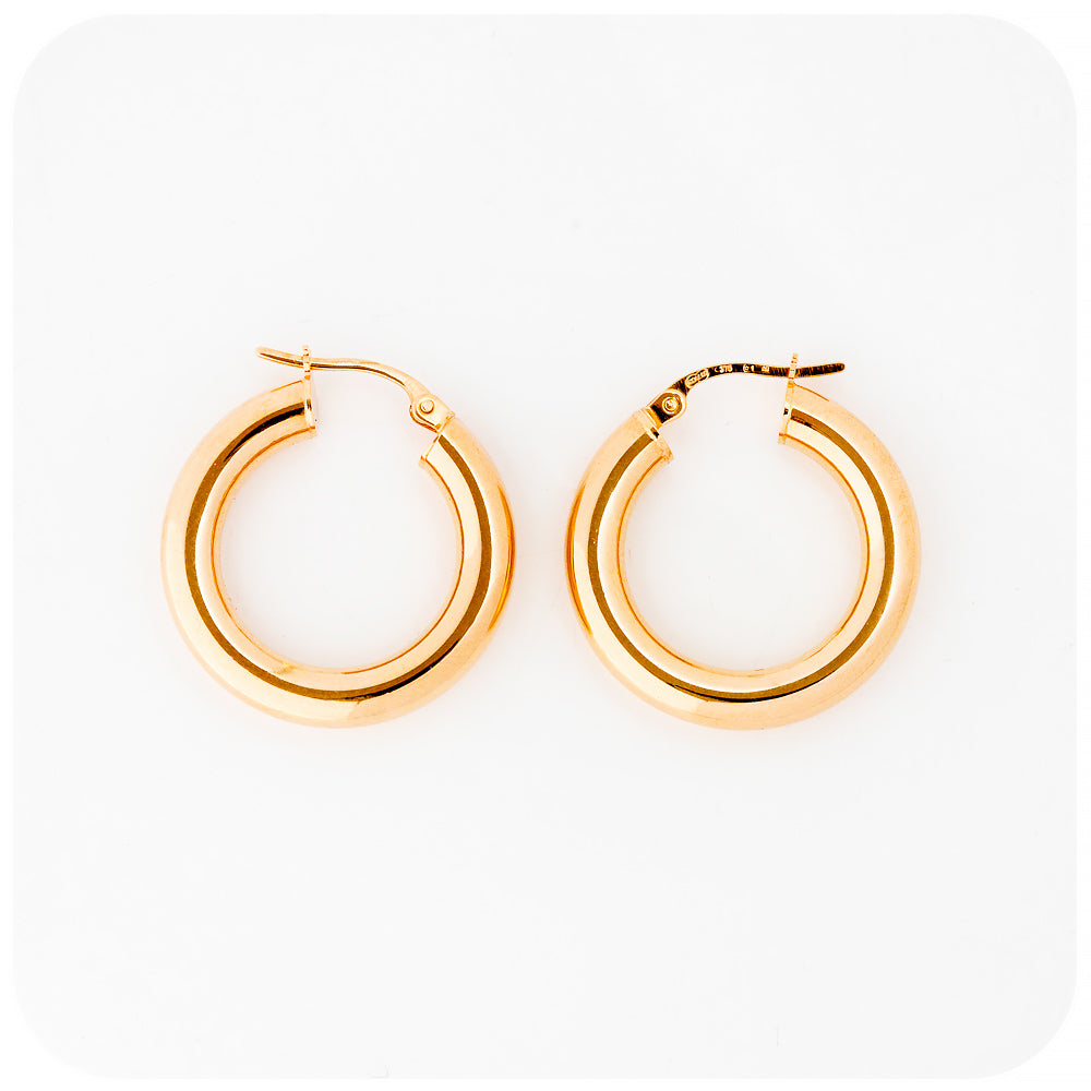 yellow gold rounded hoop earrings