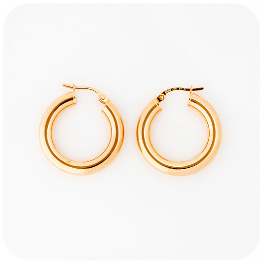 yellow gold rounded hoop earrings
