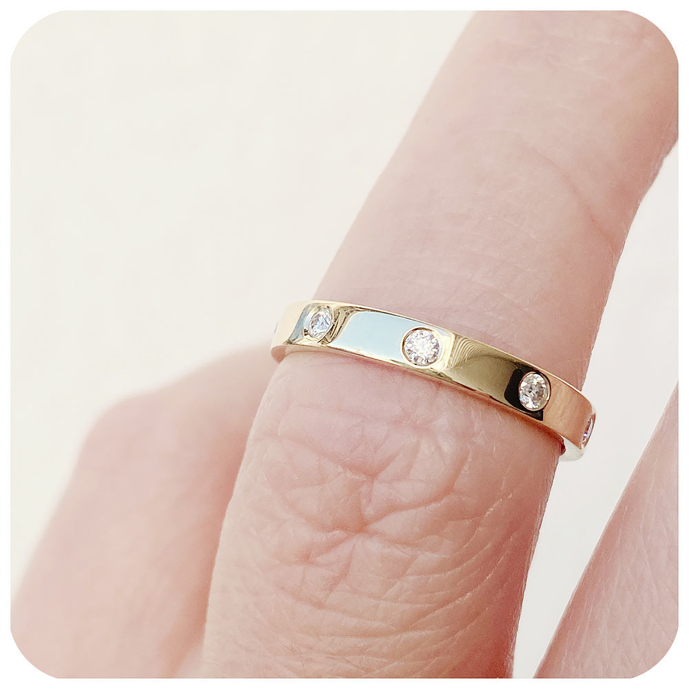 vintage style wedding band with brilliant cut moissanite flush set in a solid gold band - Victoria's Jewellery
