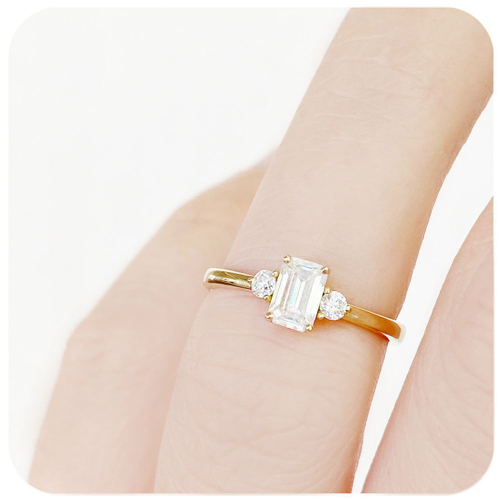 Emerald and Brilliant cut Moissanite Trilogy Engagement ring Yellow Gold - Victoria's Jewellery