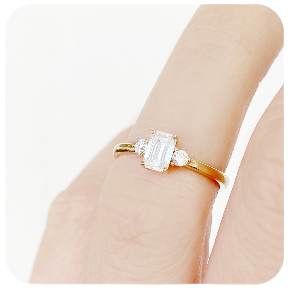 Emerald and Brilliant cut Moissanite Trilogy Engagement ring Yellow Gold - Victoria's Jewellery