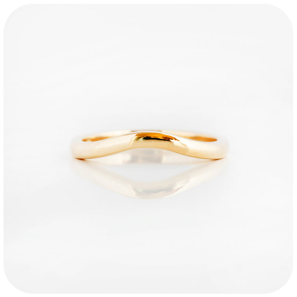 Lilly, a Curved Wedding Band in Gold