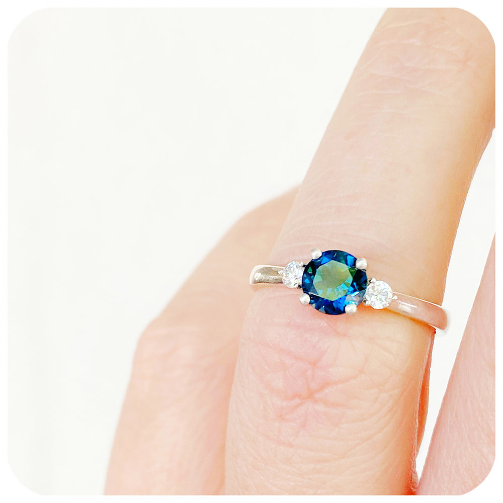 Round cut London Blue Topaz and Diamond Trilogy Engagement Ring in White Gold - Victoria's Jewellery