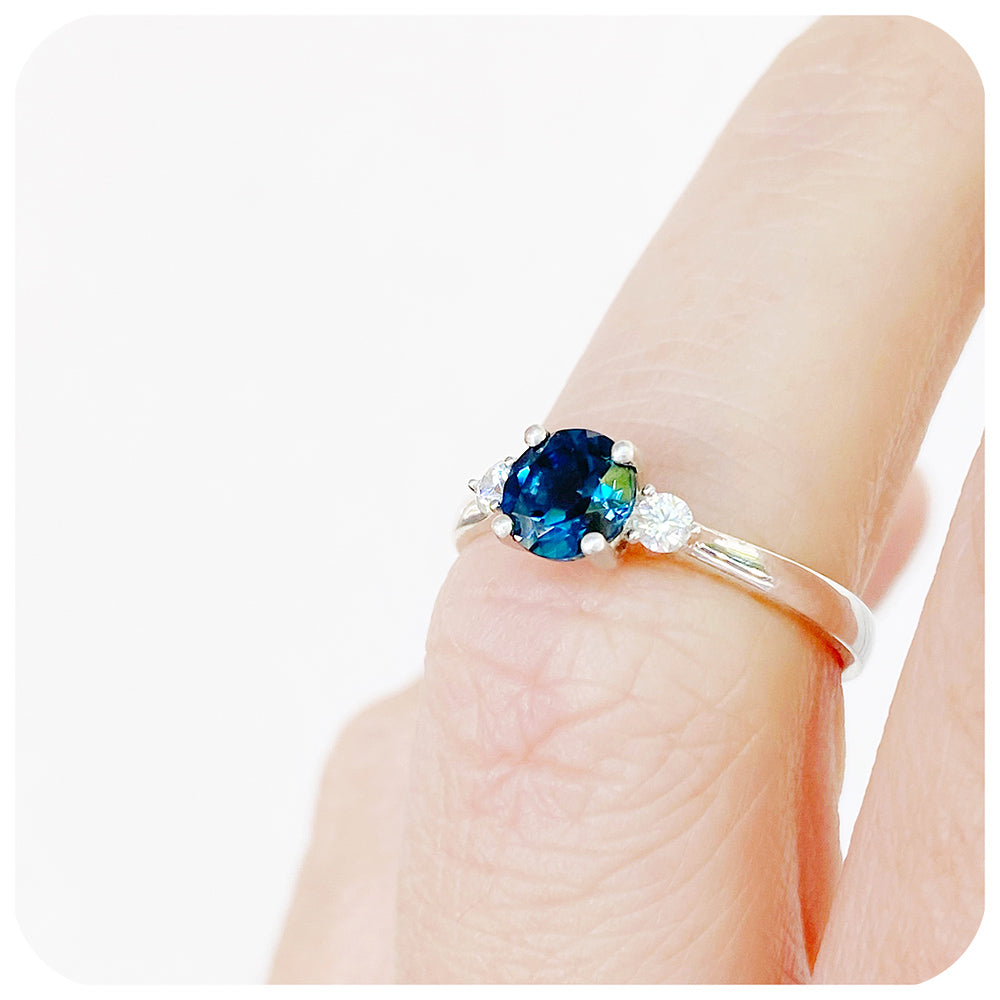 Round cut London Blue Topaz and Diamond Trilogy Engagement Ring in White Gold - Victoria's Jewellery