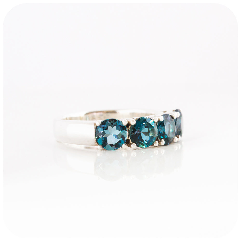 Round brilliant cut London Blue Topaz four stone Half Eternity Anniversary Ring - Victoria's Jewellery