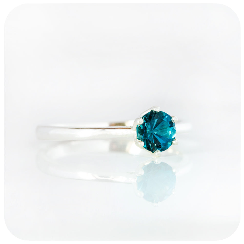 Tulip, a Six Claw London Blue Topaz Ring