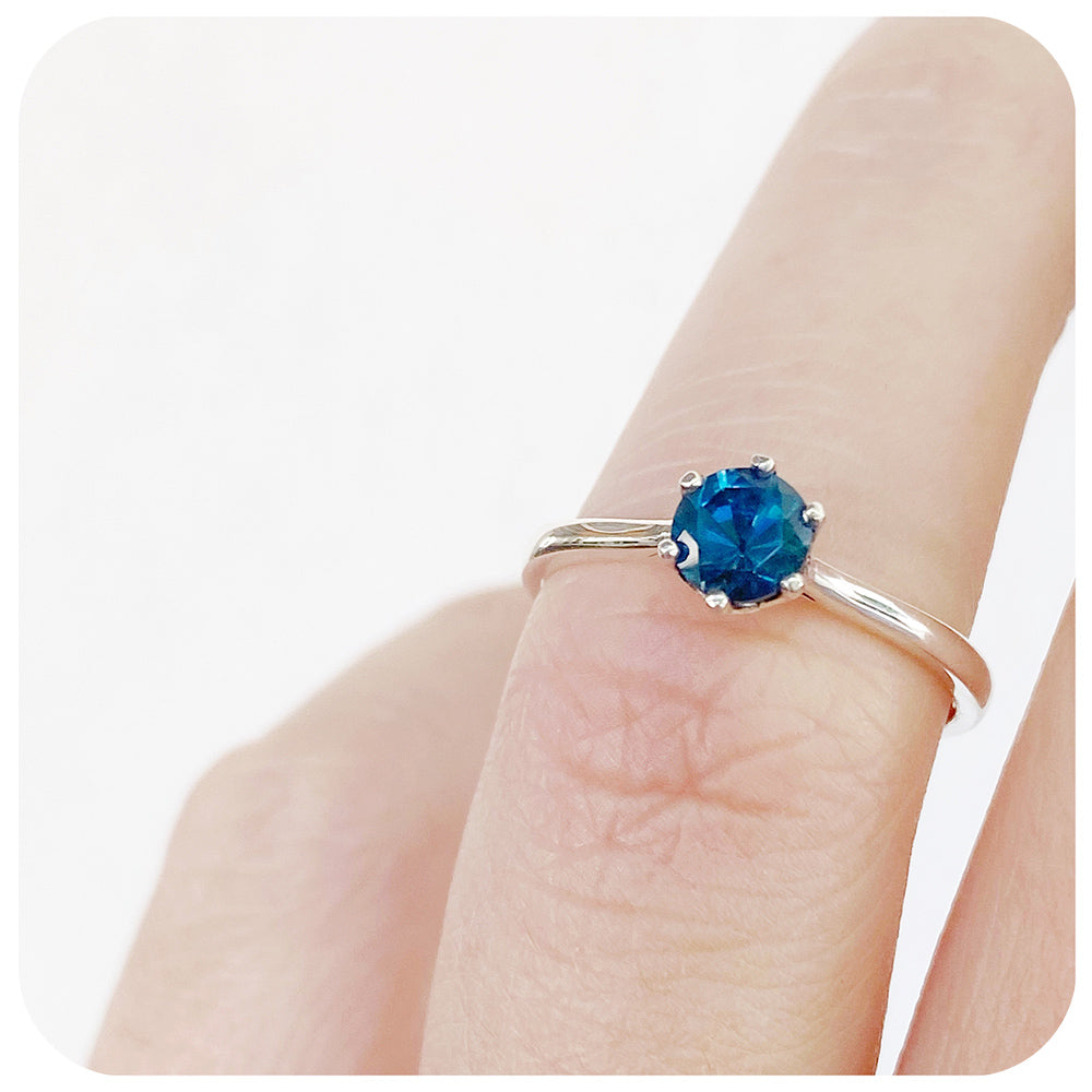 Tulip, a Six Claw London Blue Topaz Ring