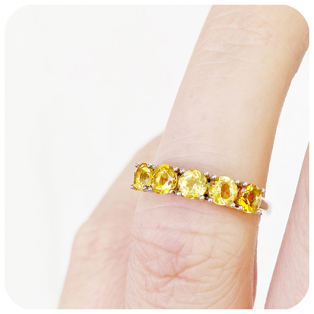 round cut yellow citrine half eternity anniversary ring