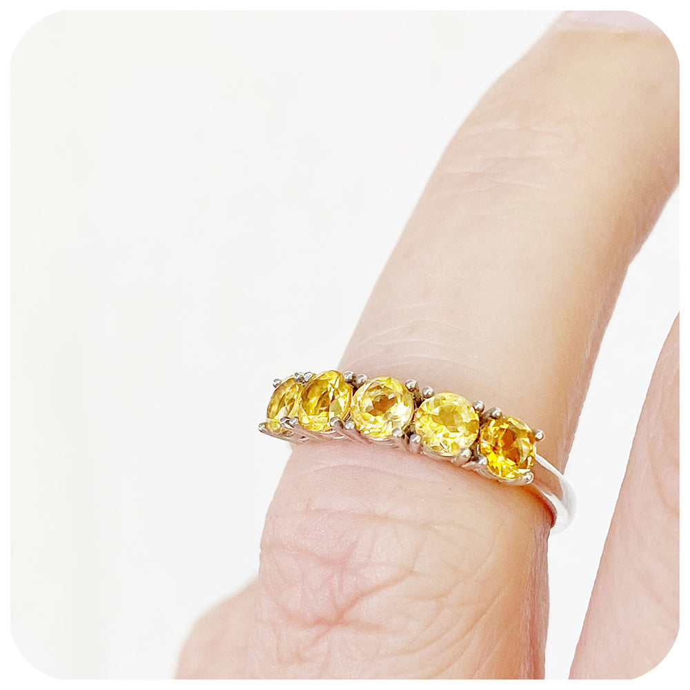 round cut yellow citrine half eternity anniversary ring
