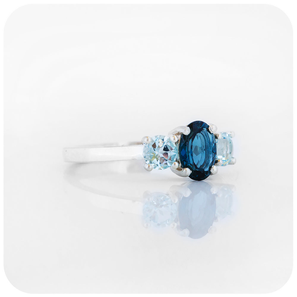 Oval cut London and Sky Blue Topaz Trilogy Engagement Ring - Victoria's Jewellery