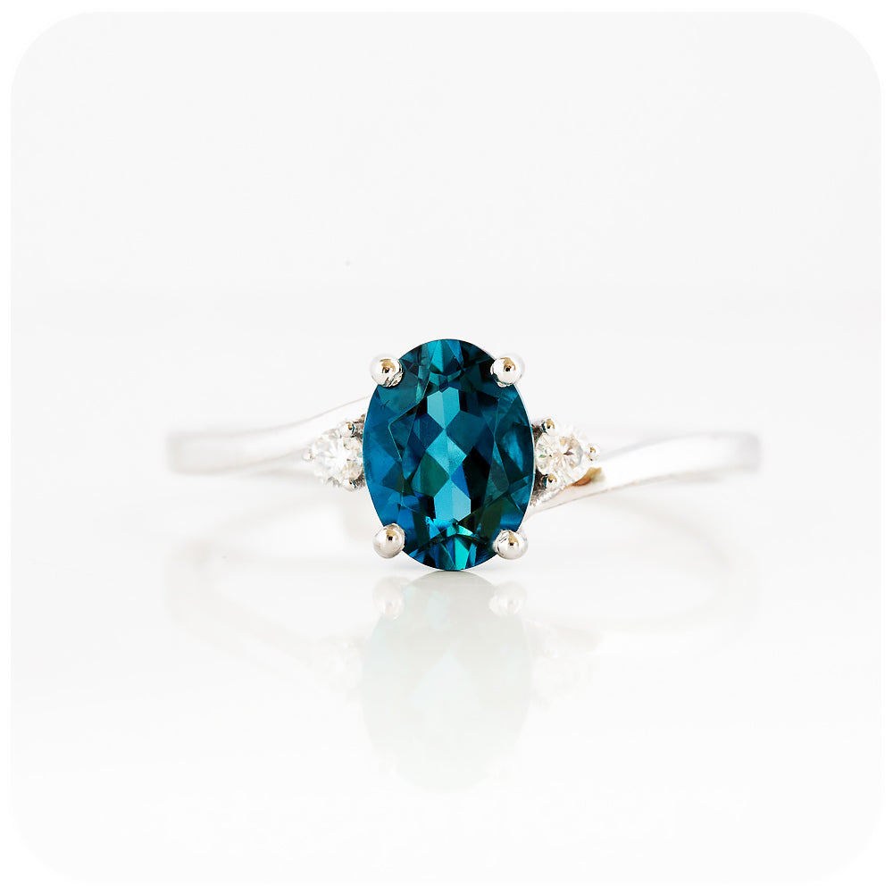 Oval cut Teal London Blue Topaz November Birthstone and Moissanite Trilogy Engagement Ring - Victoria's Jewellery
