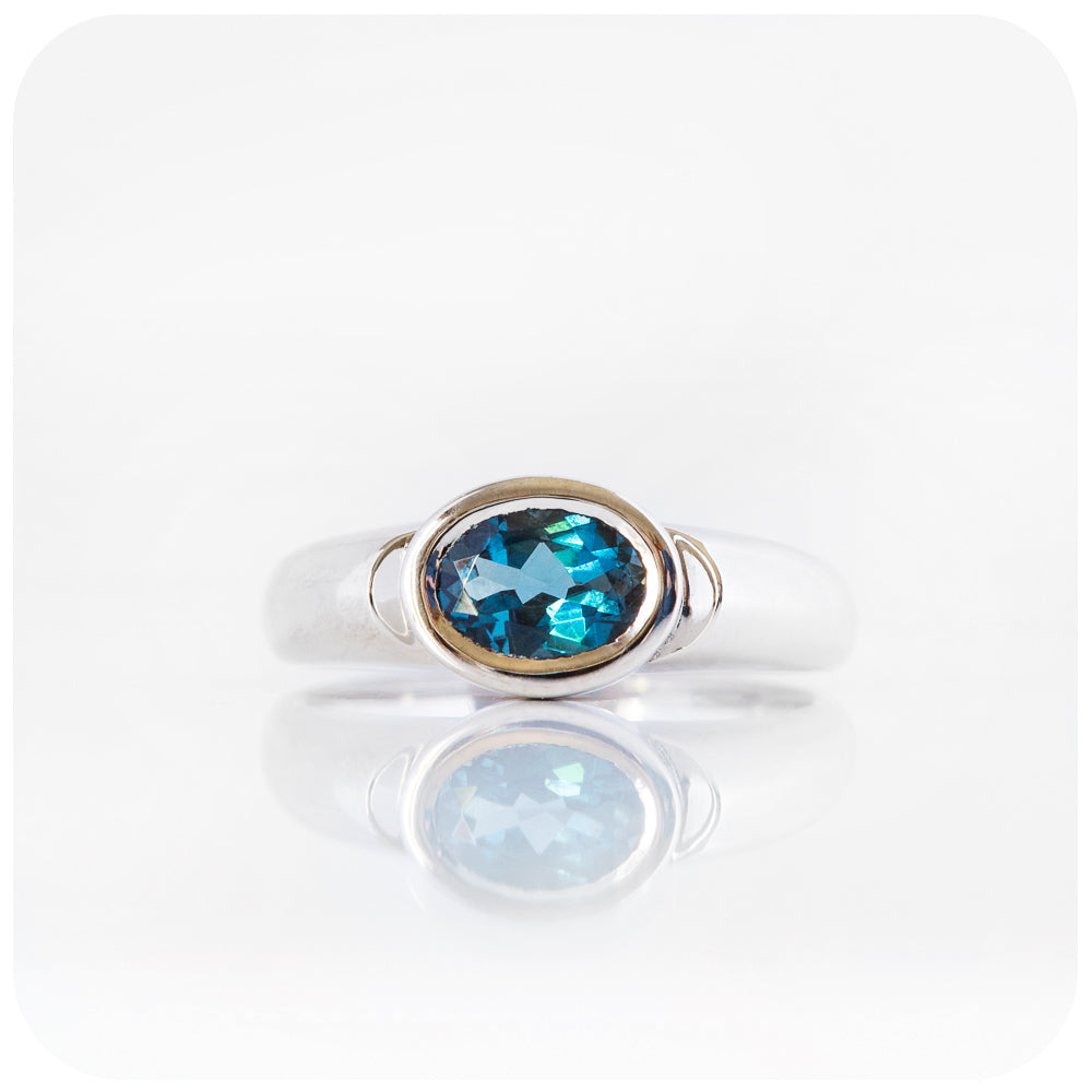 Oval cut London Blue Topaz Solitaire Ring in Sterling Silver