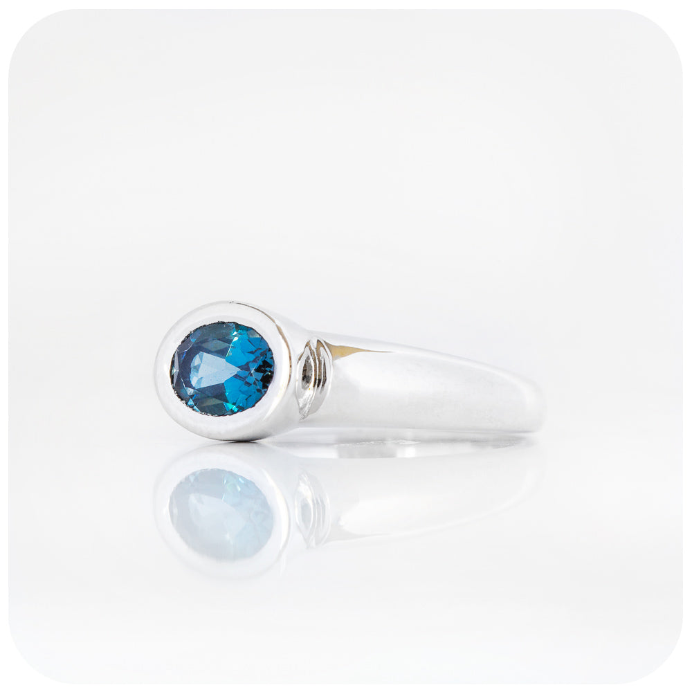 Oval cut London Blue Topaz Solitaire Ring in Sterling Silver