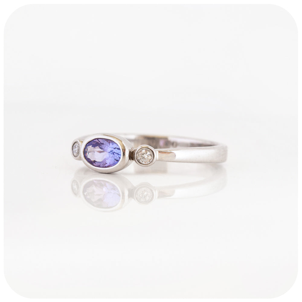 oval cut tanzanite and cubic zirconia stack ring in sterling silver
