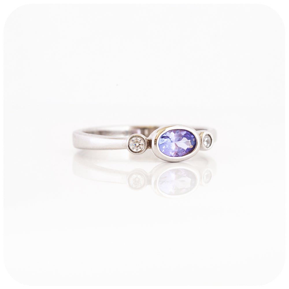 oval cut tanzanite and cubic zirconia stack ring in sterling silver