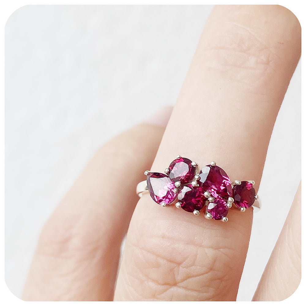 reddish-pink rhodolite garnet cluster anniversary ring
