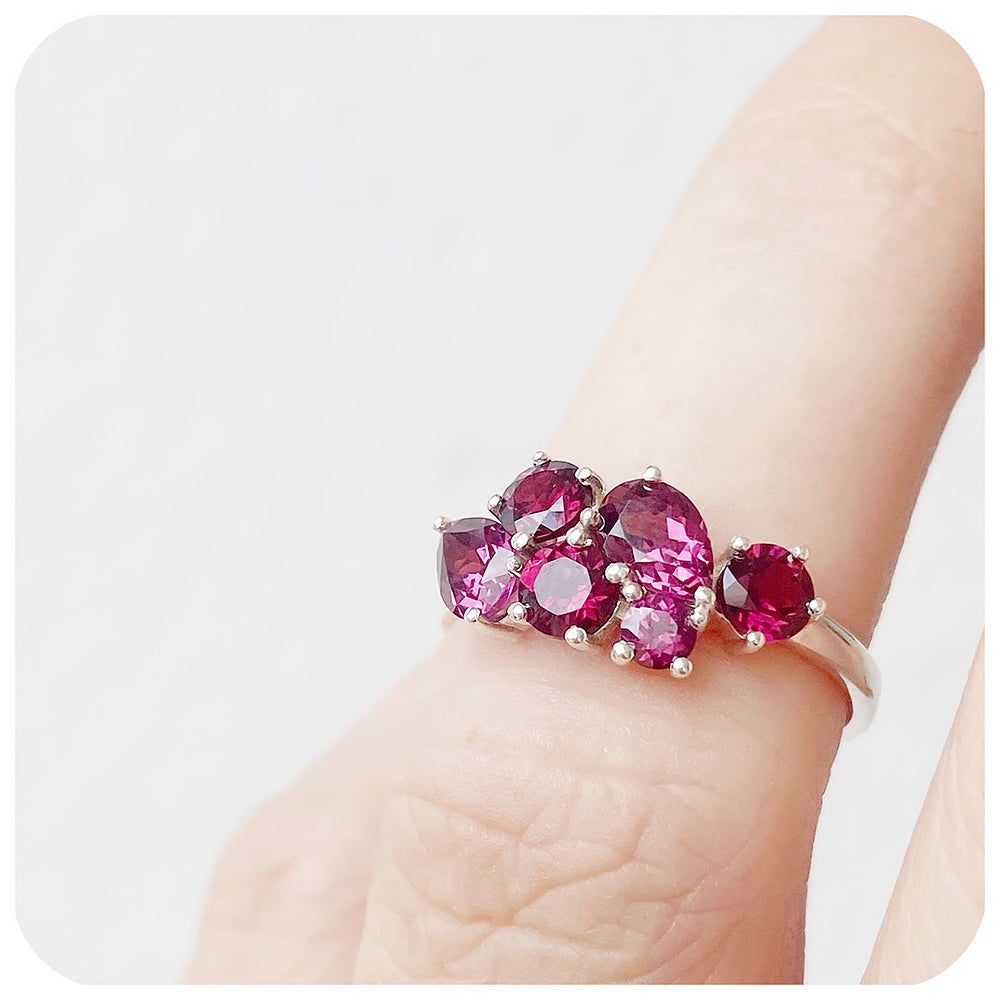 reddish-pink rhodolite garnet cluster anniversary ring
