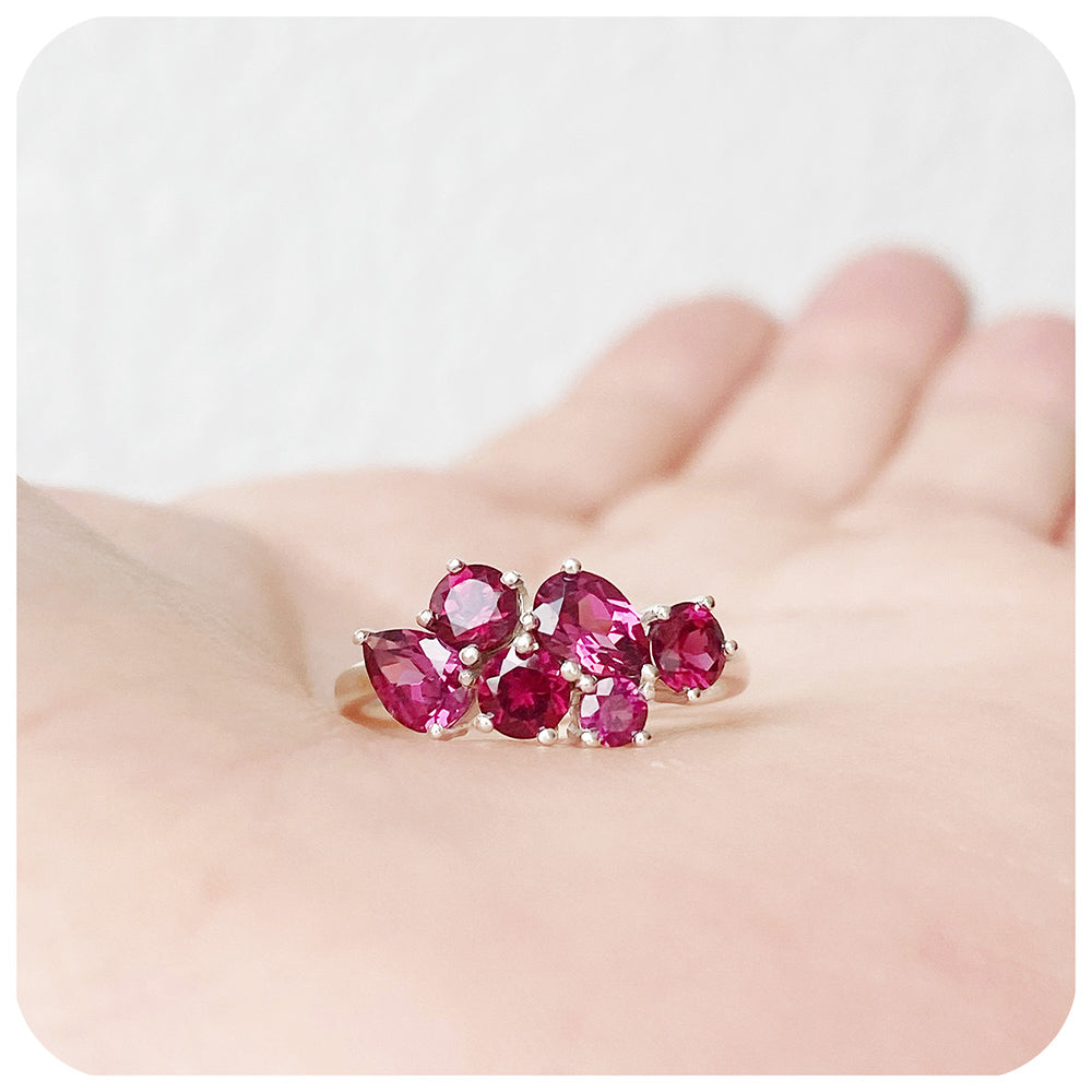 reddish-pink rhodolite garnet cluster anniversary ring