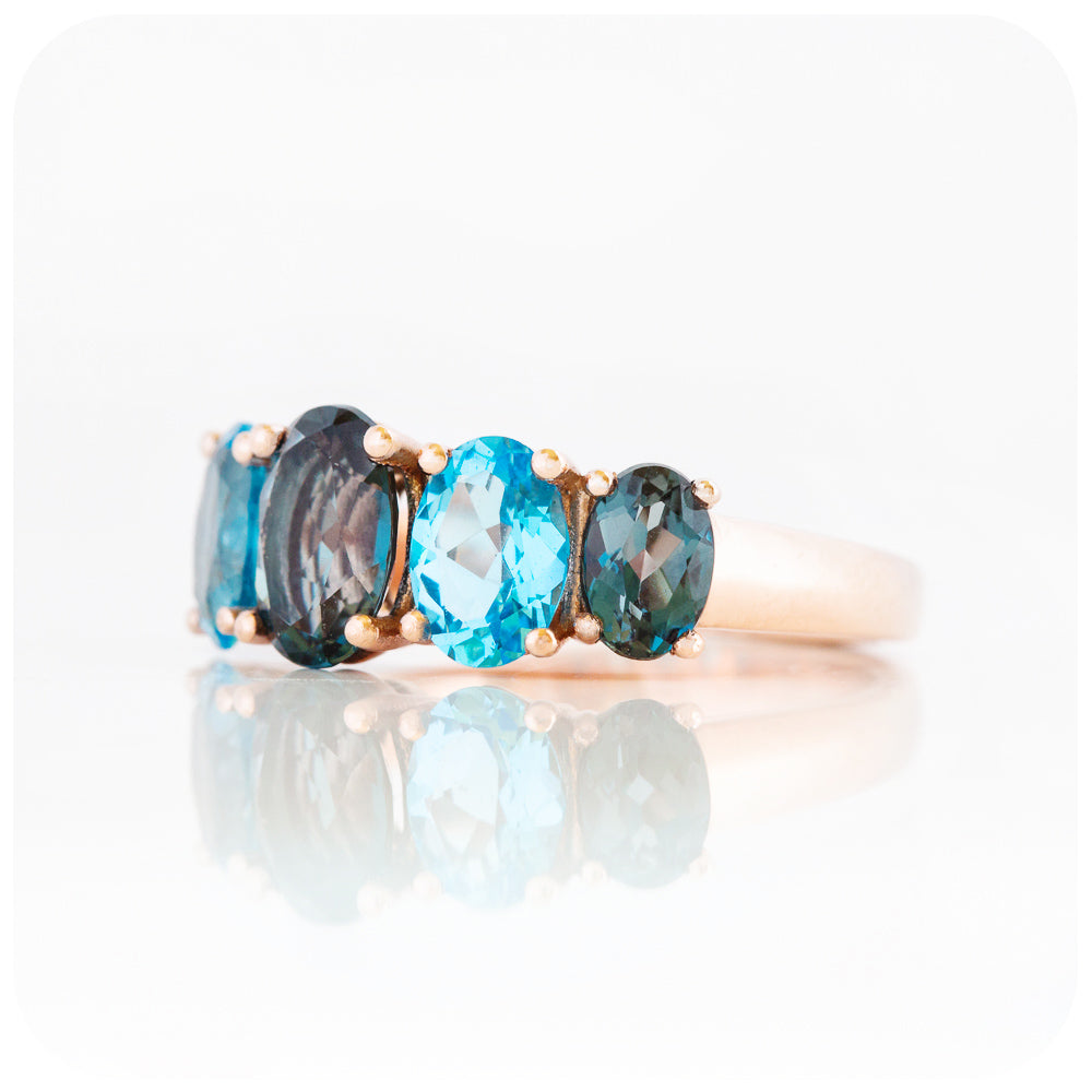 Oval cut Graduated London and Swiss Blue Topaz Anniversary or November Birthstone Ring in Rose Gold - Victoria's Jewellery