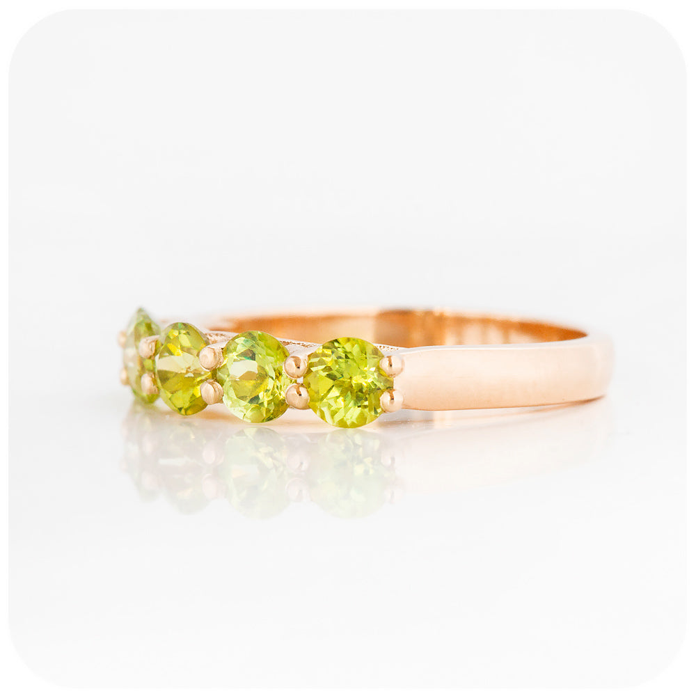 Danelle, a Peridot Half Eternity Trellis Ring