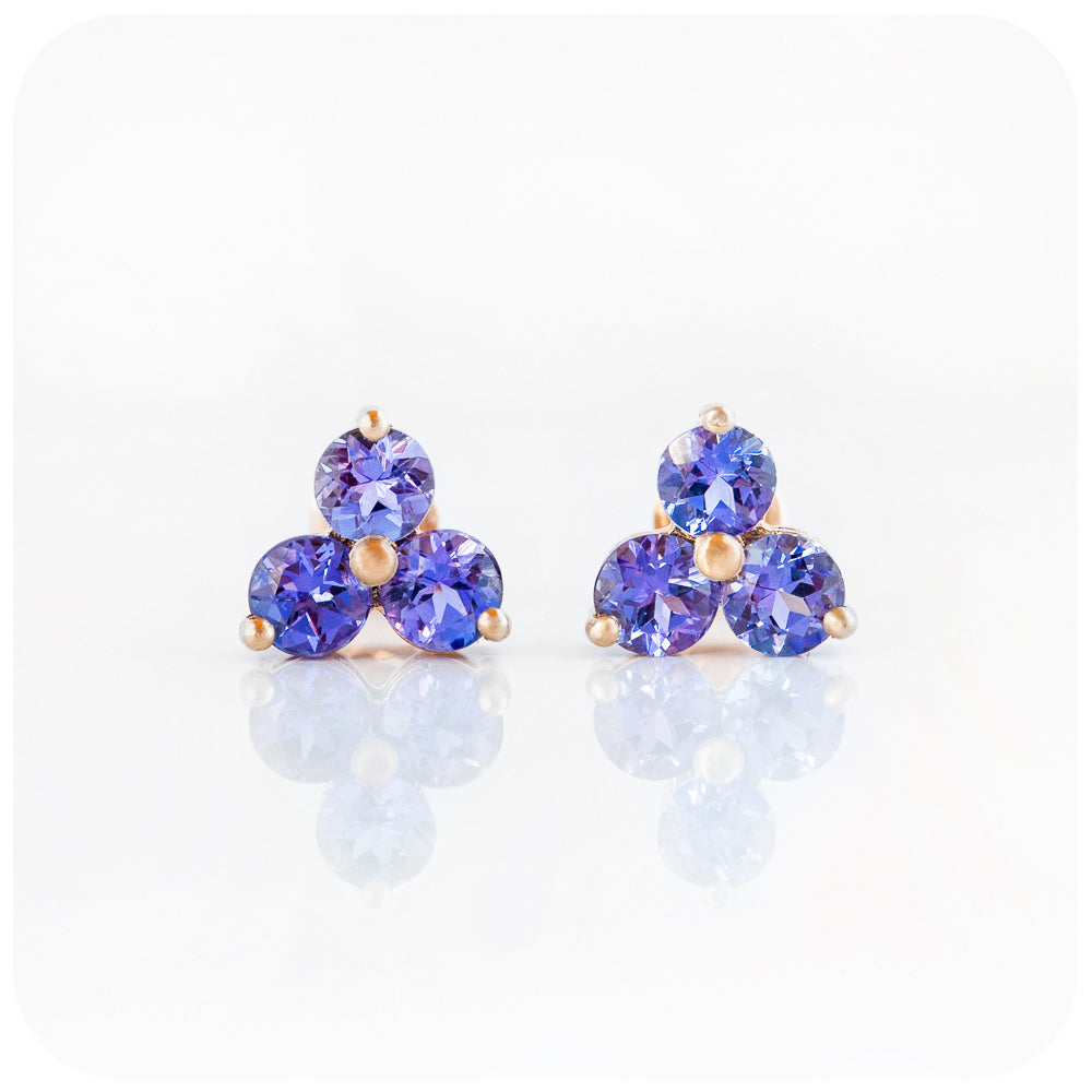 brilliant cut tanzanite trilogy stud earrings in rose gold