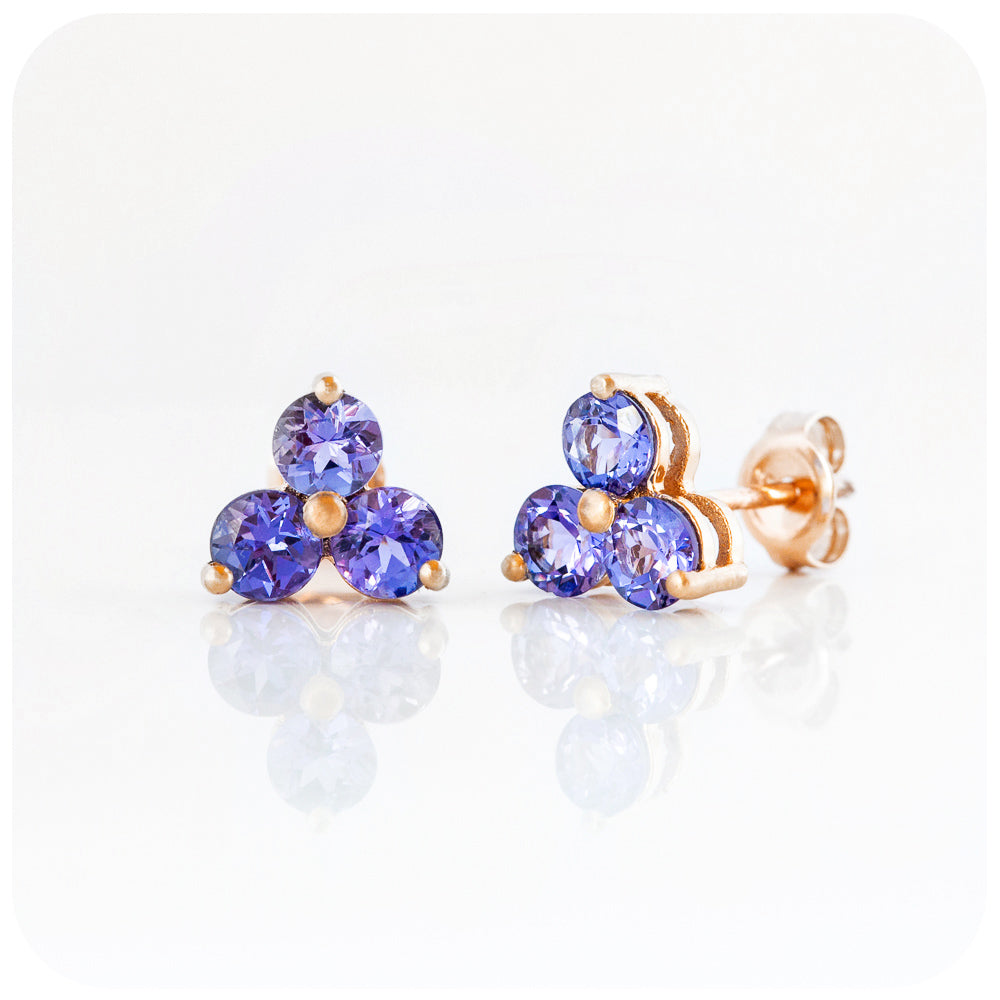 brilliant cut tanzanite trilogy stud earrings in rose gold