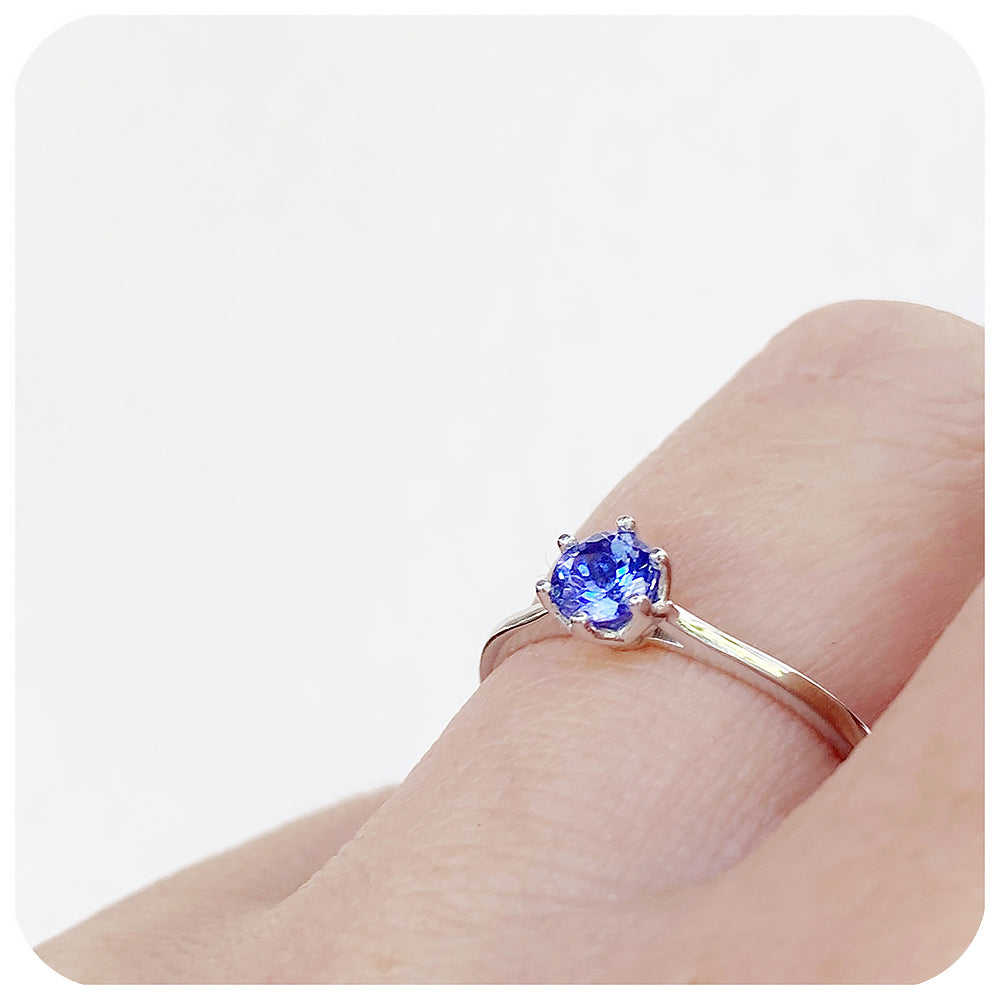 Tulip, a Six Claw Round cut Tanzanite Ring
