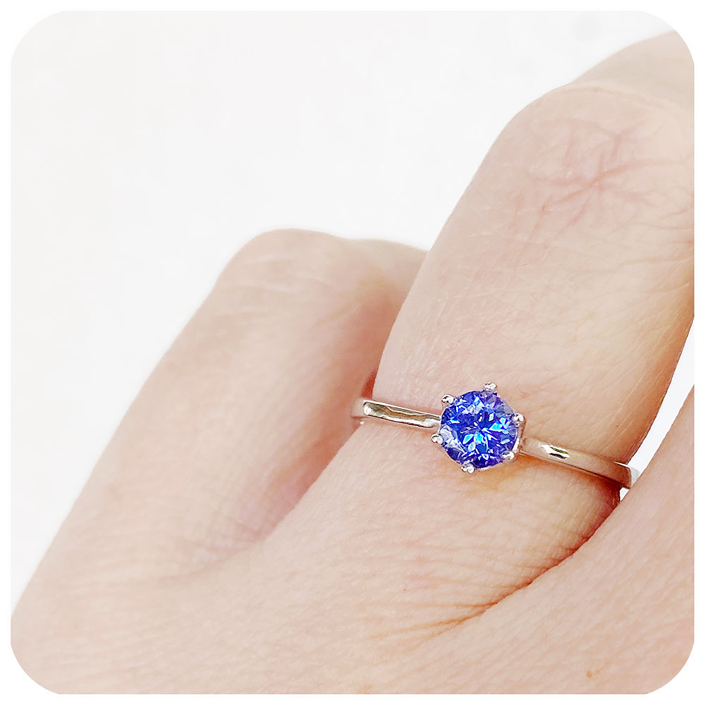 Tulip, a Six Claw Round cut Tanzanite Ring