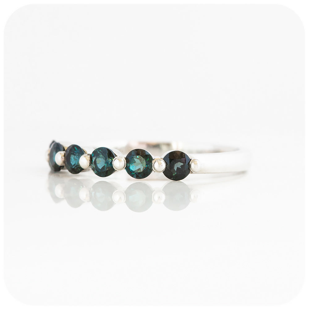 teal london blue topaz half eternity stack ring with shared claws