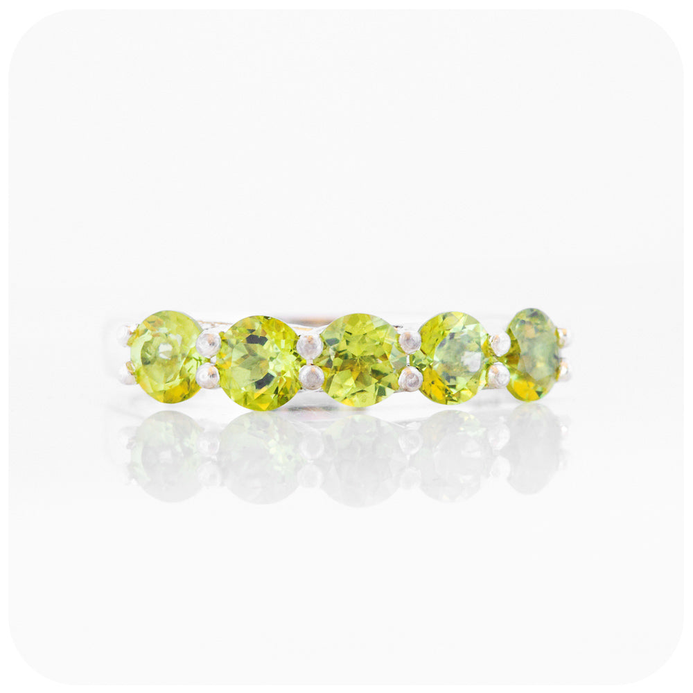 Danelle, a Peridot Half Eternity Trellis Ring