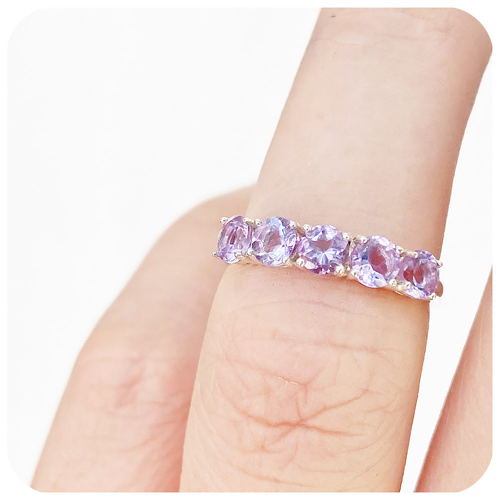 brilliant cut pink amethyst half eternity anniversary or birthstone ring