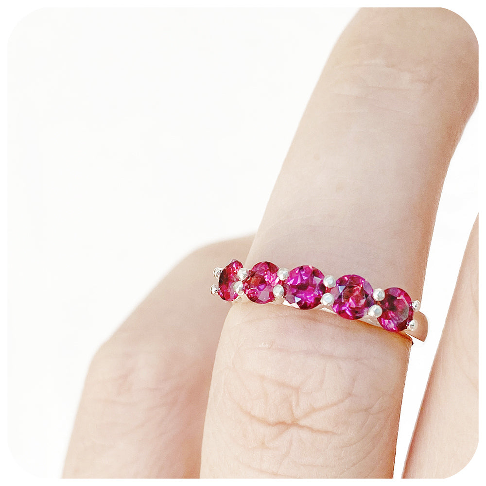 The Danelle, a Rhodolite Garnet Half Eternity Trellis Ring