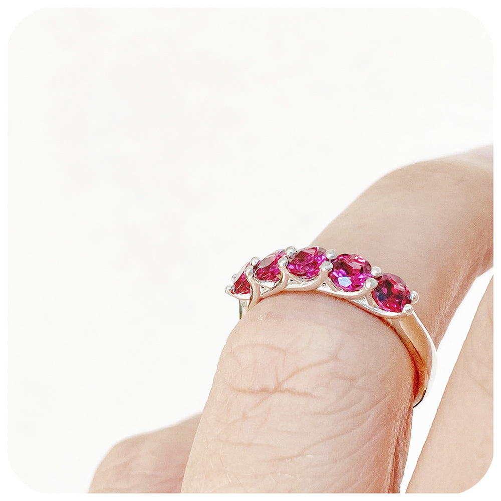 The Danelle, a Rhodolite Garnet Half Eternity Trellis Ring