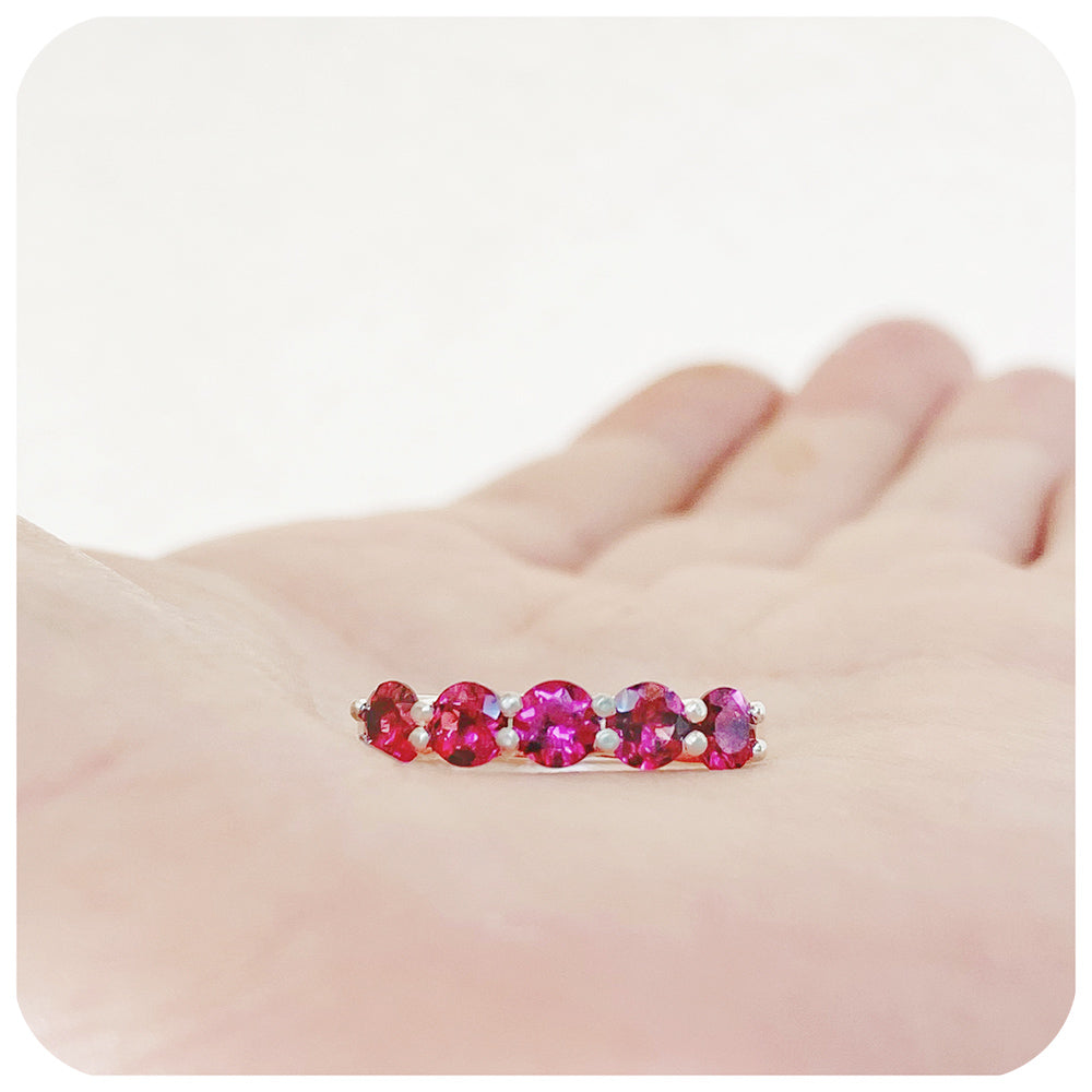 The Danelle, a Rhodolite Garnet Half Eternity Trellis Ring