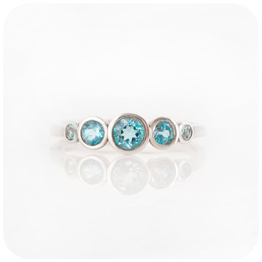 Gabriella, a Swiss Blue Topaz Half Eternity Ring