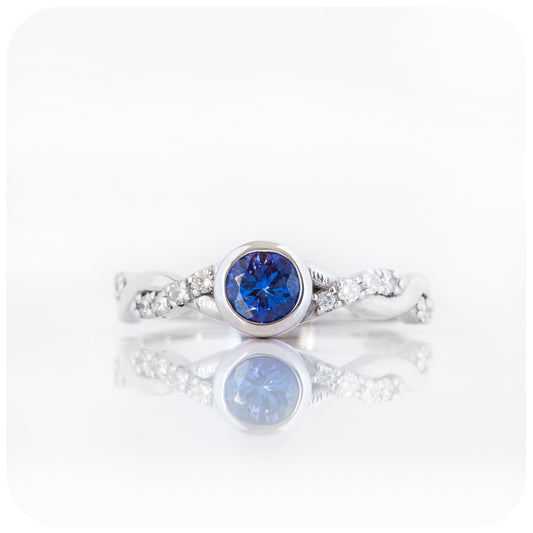 tanzanite and moissanite infinity style wedding ring