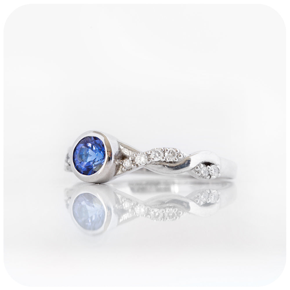 tanzanite and moissanite infinity style wedding ring