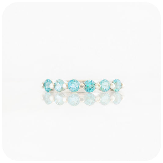 Ellie, a Swiss Blue Topaz Six Stone Half Eternity Ring