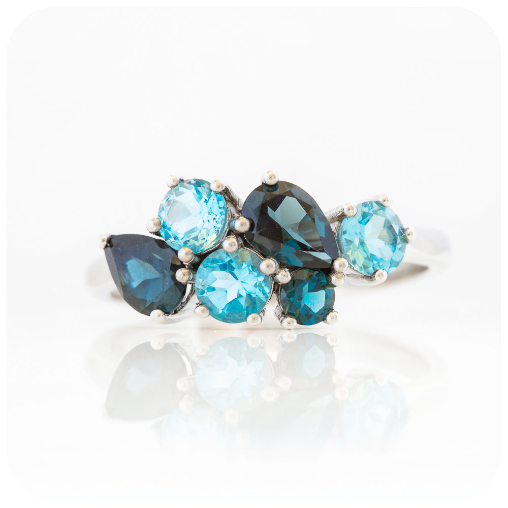 The Ena, a Cluster Ring with London and Swiss Blue Topaz