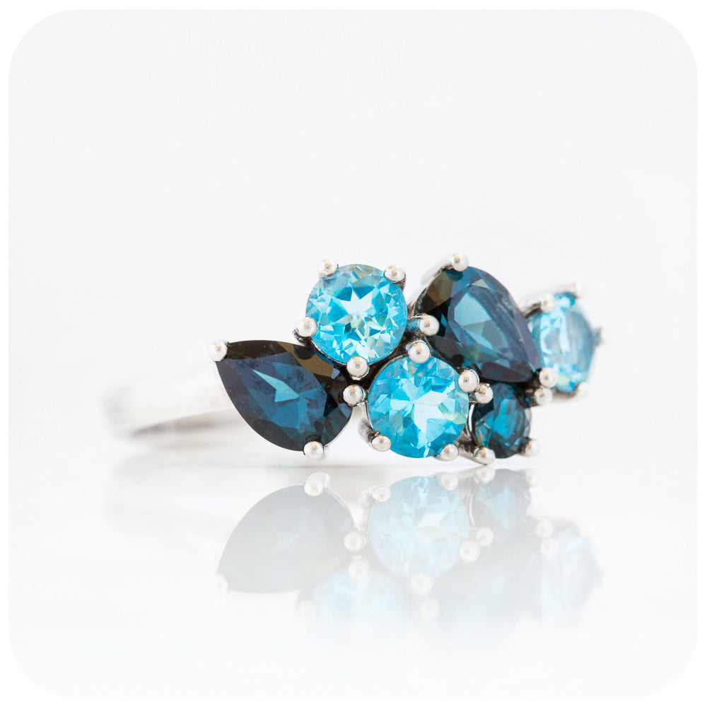 The Ena, a Cluster Ring with London and Swiss Blue Topaz