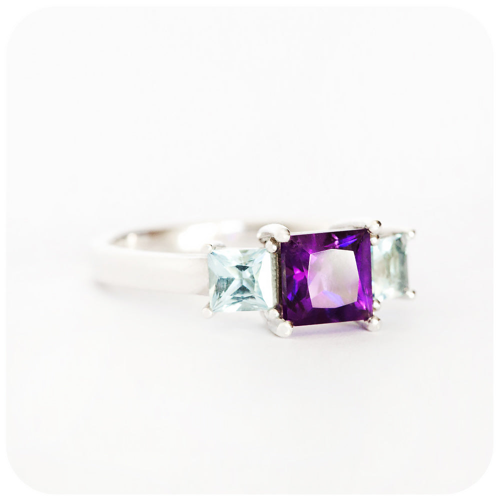 Princess cut Amethyst and Sky Blue Topaz Trilogy Ring in Sterling Silver