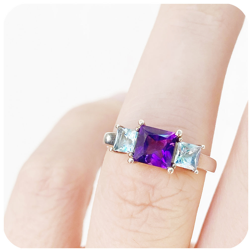 Princess cut Amethyst and Sky Blue Topaz Trilogy Ring in Sterling Silver