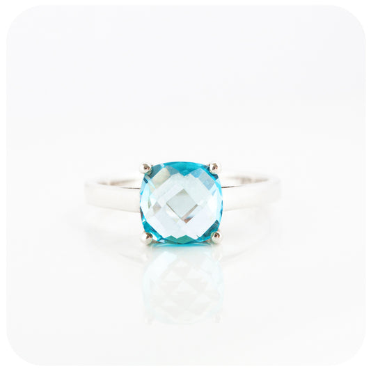 Cushion cut Sky Blue Topaz Solitaire Ring in Sterling Silver