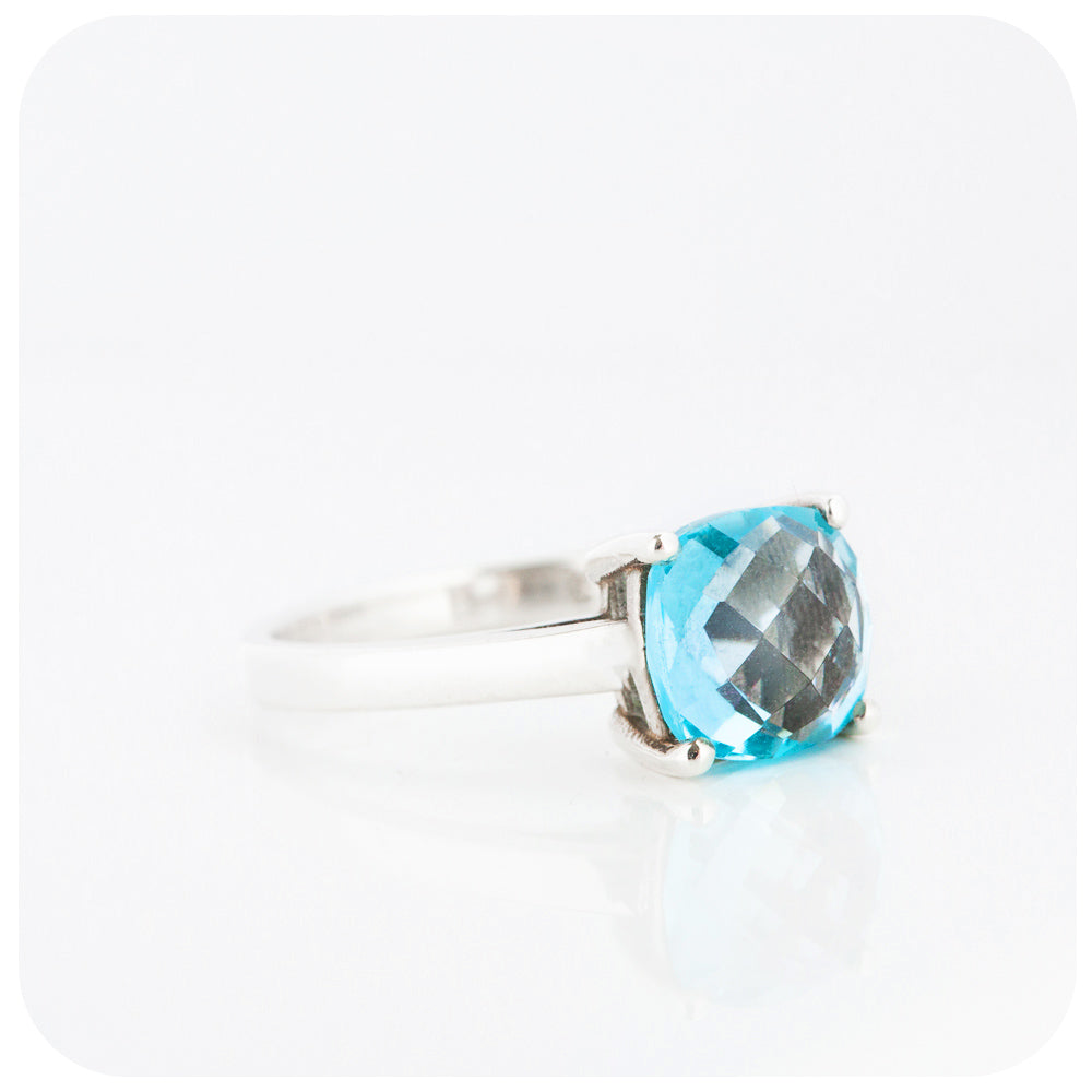 Cushion cut Sky Blue Topaz Solitaire Ring in Sterling Silver